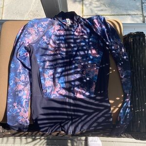 Lululemon size 4 zip up. Floral and great condition.